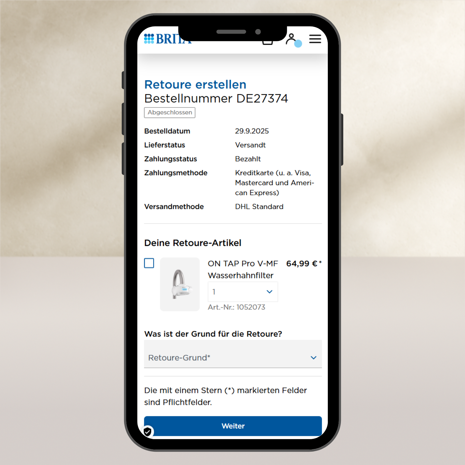 Smartphone mit Screenshot der MyBRITA Retouren-Seite Smartphone mit Screenshot der MyBRITA Retouren-Seite